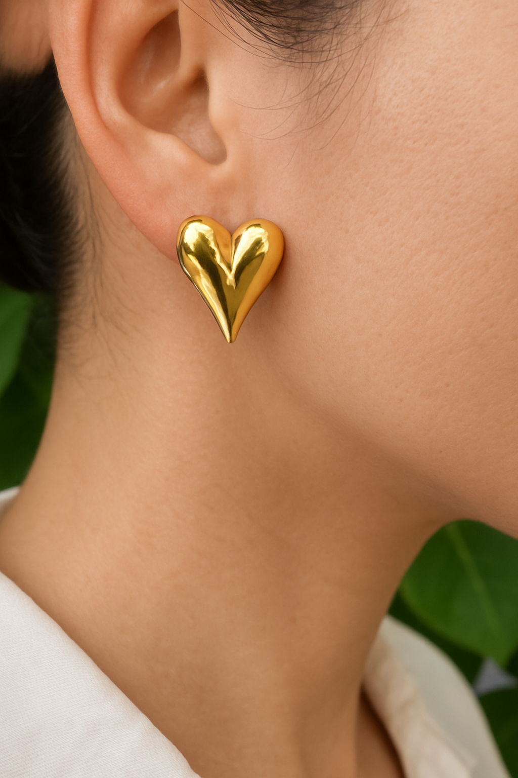 Radiant Heart Gold Stud Earrings